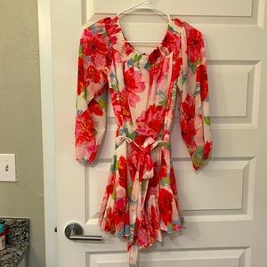 Floral romper with detachable belt.
